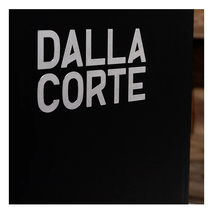 A smartphone screen showing the Dalla Corte Mina Espresso Machine Wood App, with options for creating and saving flow profiles