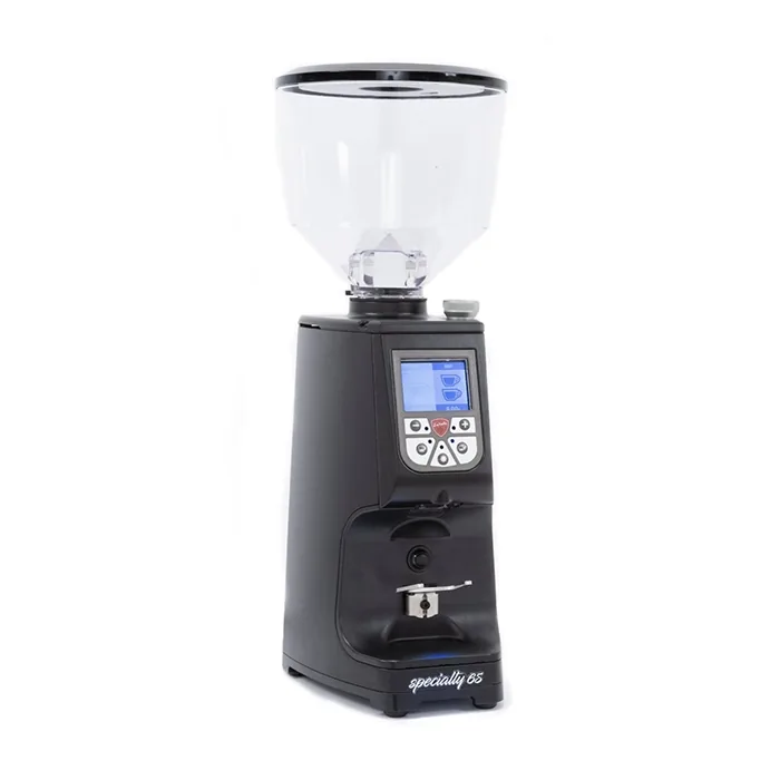 A sleek, Eureka Atom Specialty 65 black espresso grinder on a kitchen counter, highlighting its compact design