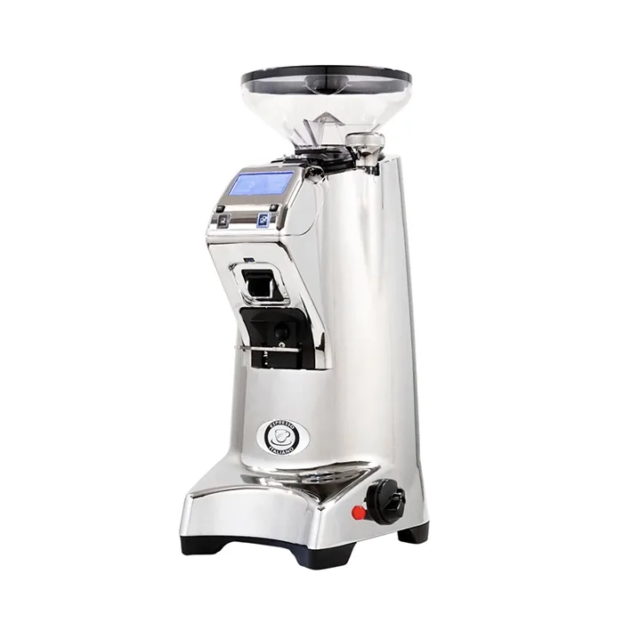 A portafilter resting in the adjustable fork of the Eureka Olympus 75E Espresso Grinder Chrome, ready for hands-free grinding