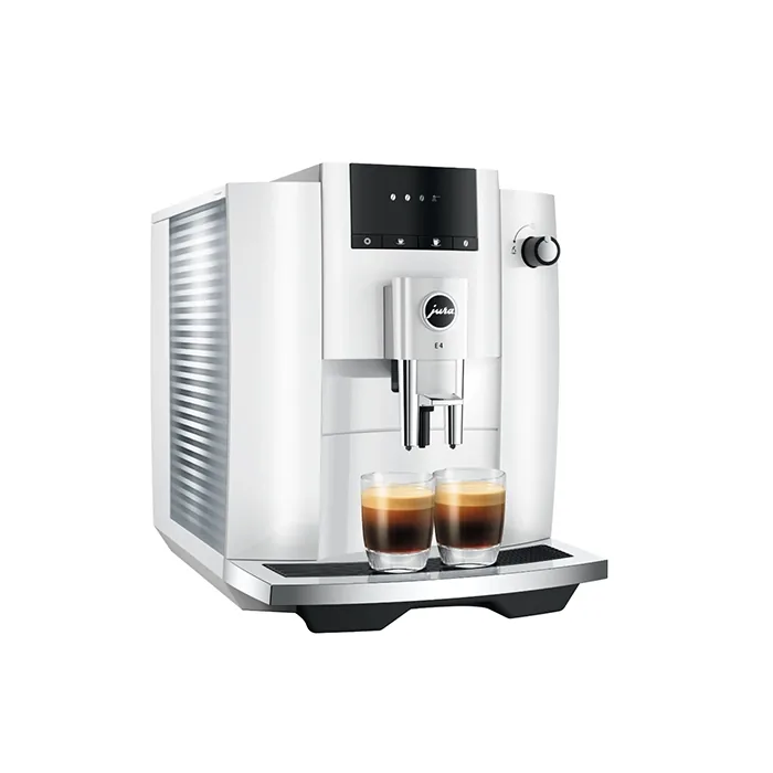 A sleek JURA E4 espresso machine white, showcasing its minimalist design on a kitchen counter