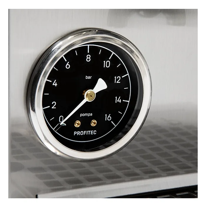 A detailed view of the redesigned, BPA-free plastic drip tray of the Profitec GO Espresso Machine Stainless Steel, emphasizing its increased capacity and cutouts