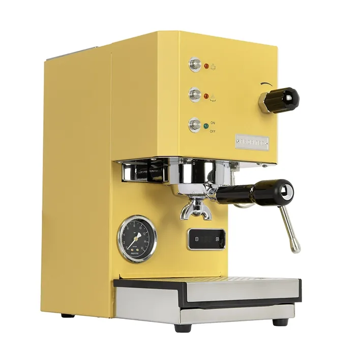 A sleek, Profitec GO Espresso Machine Yellow on a countertop, showcasing its compact size and front panel controls