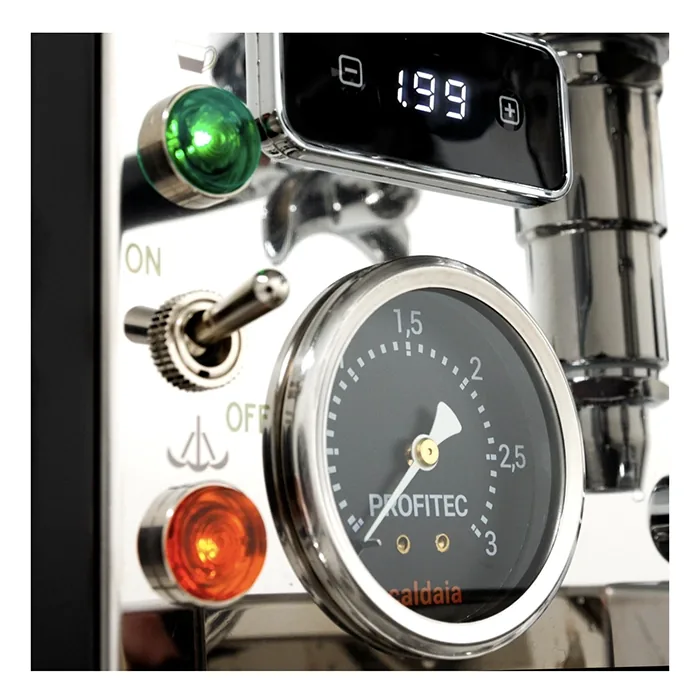 An internal view of the Profitec Pro 700 Espresso Machine, showing its well-organized copper coils, water lines, and shielded electronics