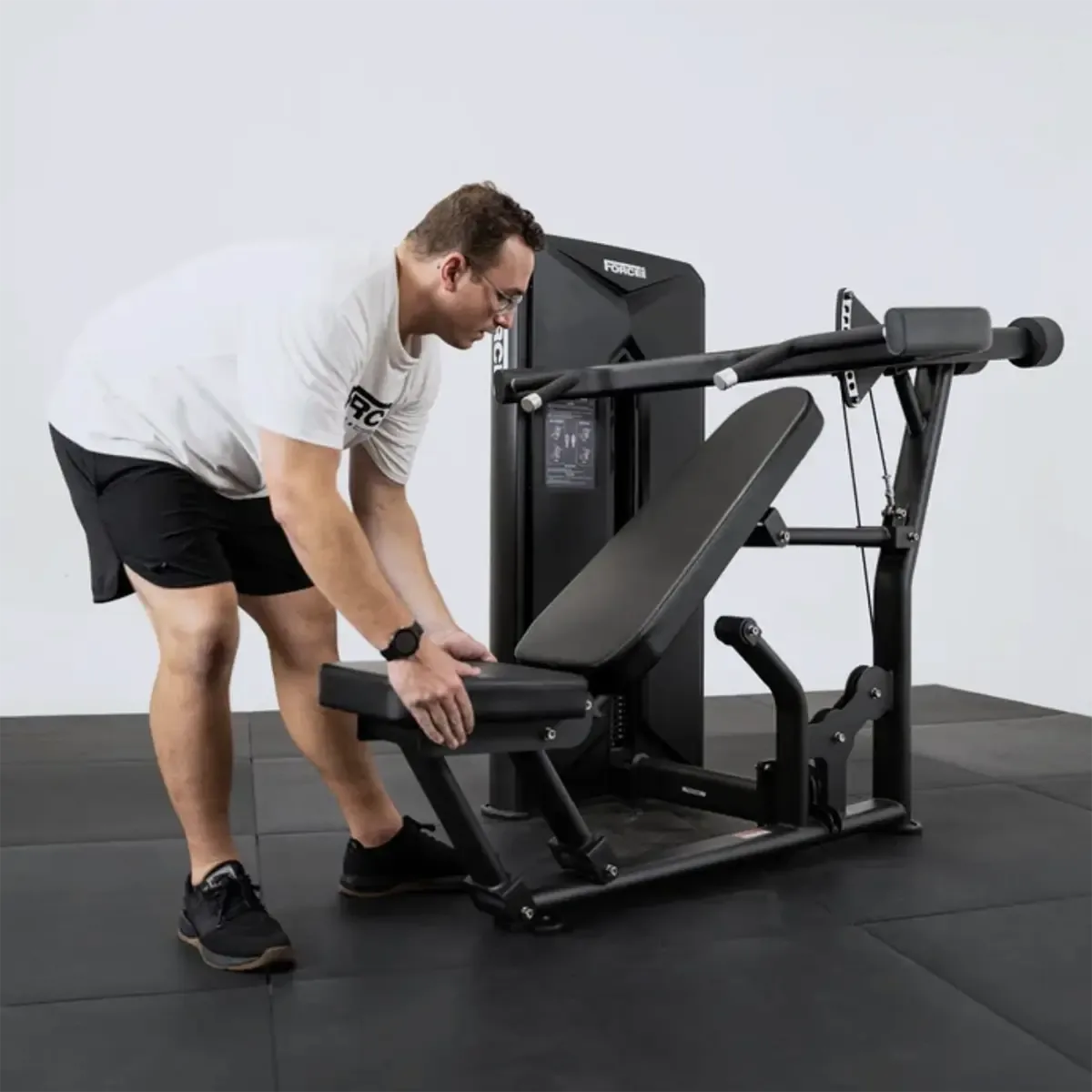 Pin-loaded Force USA press machine with adjustable seat and oval tube frame