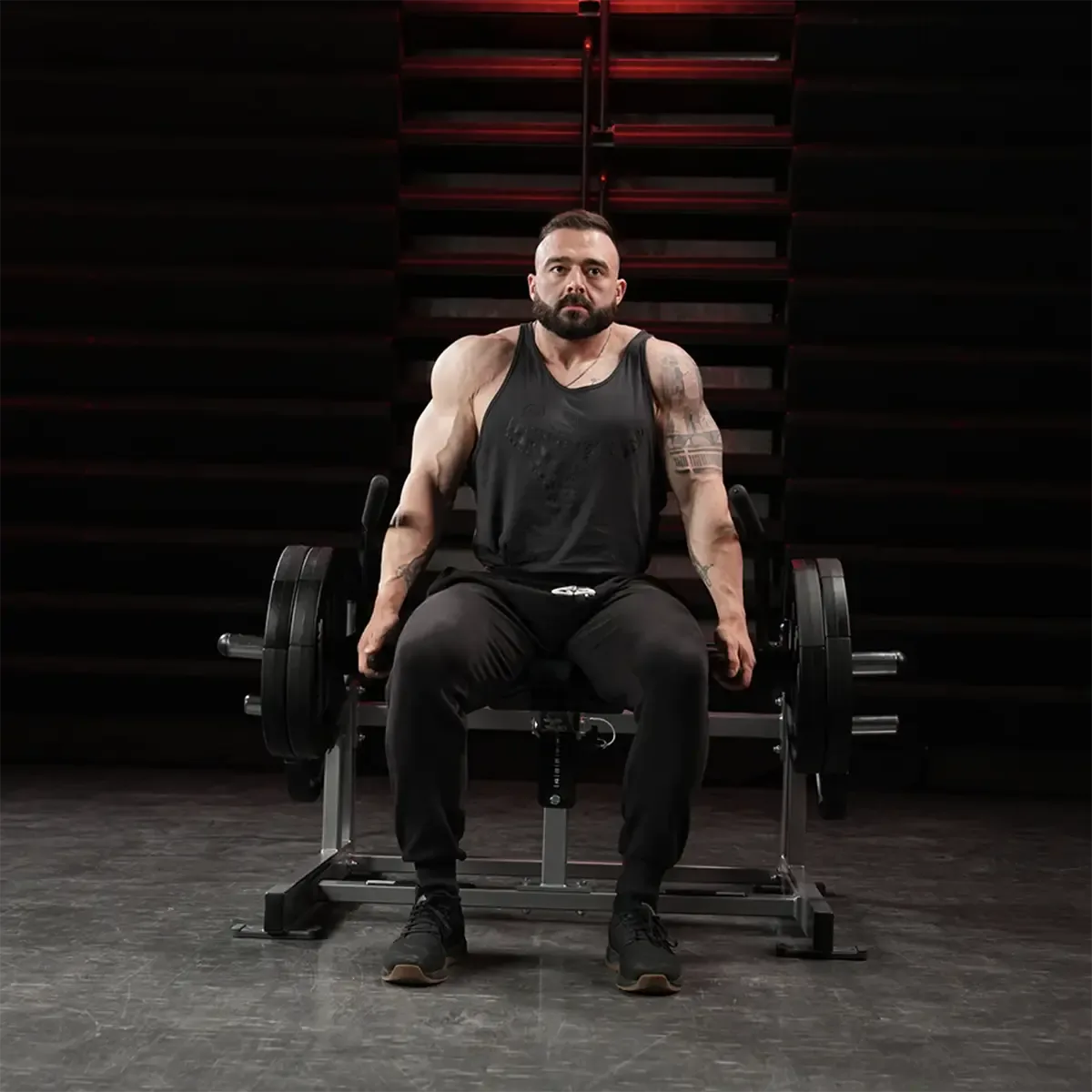 Hammer Strength trap machine for seated or standing shrug exercises