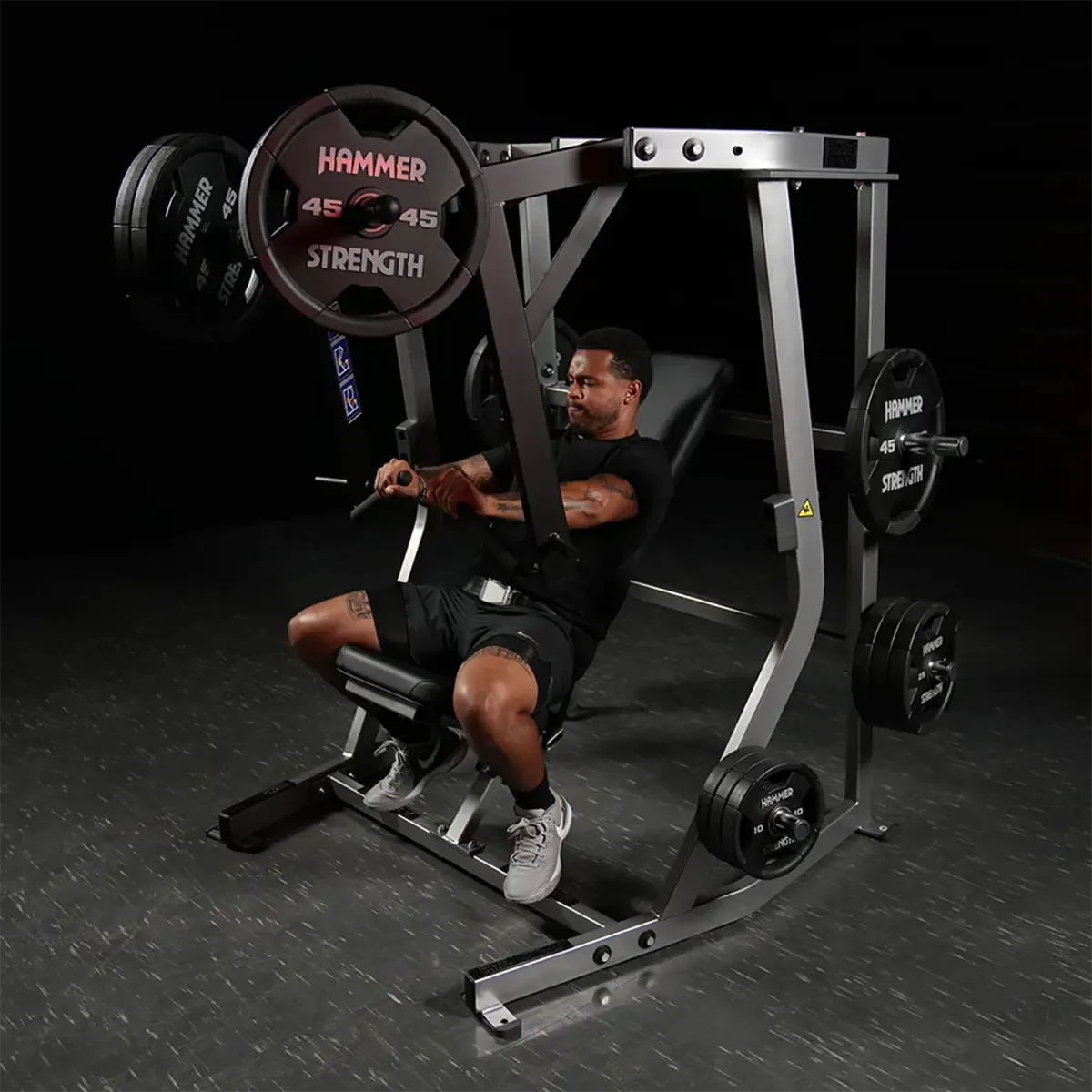 Hammer Strength chest press in upright seated position with independent arms