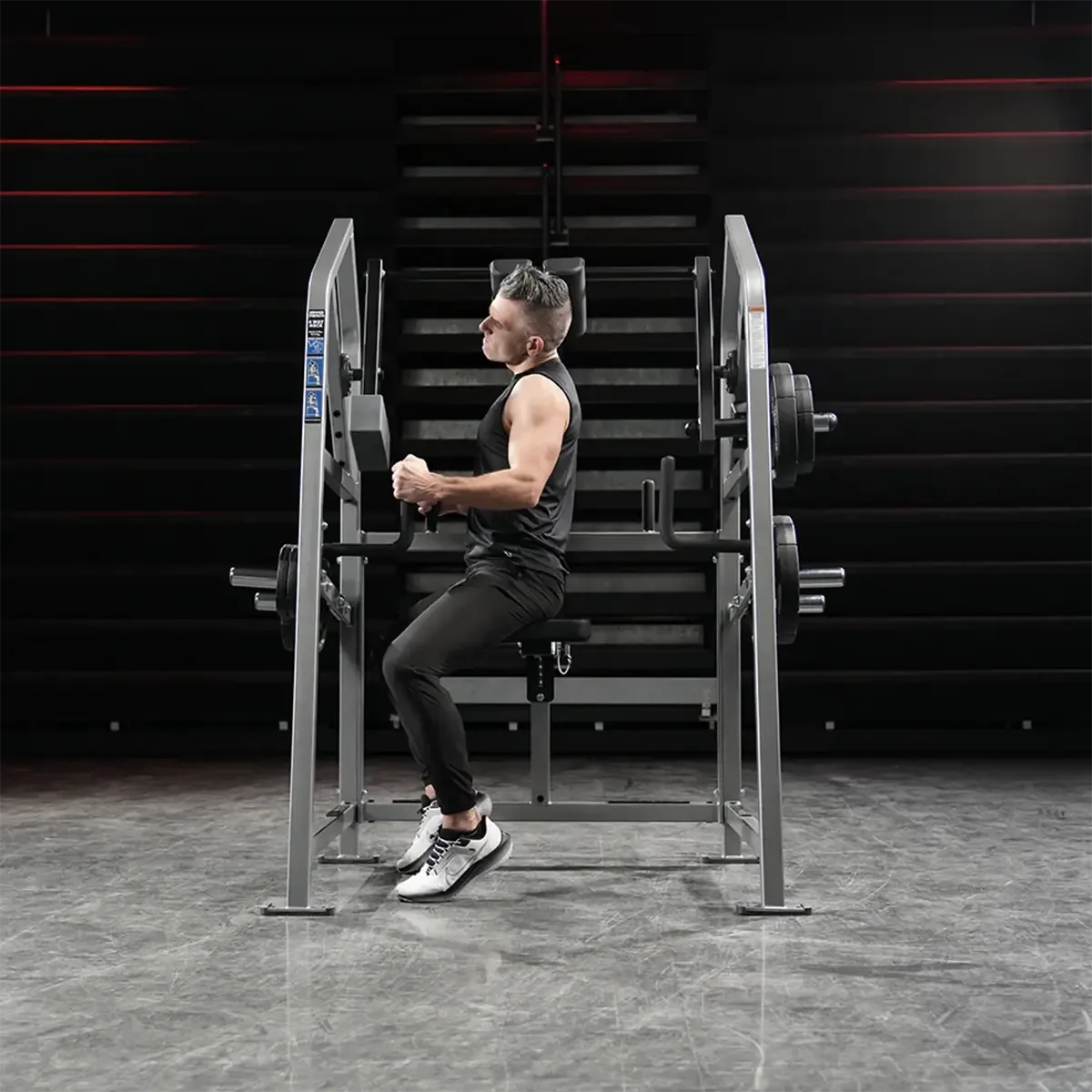 Hammer Strength neck trainer with adjustable seat and grip points