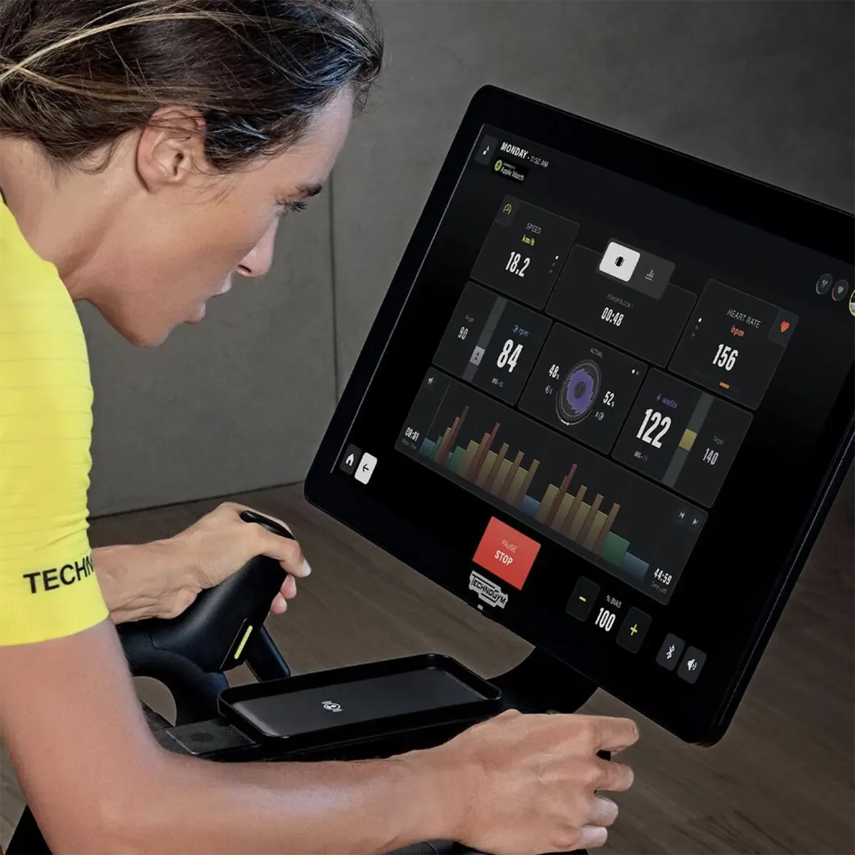 Technogym Ride Smart indoor bike with touchscreen console and bottle holder