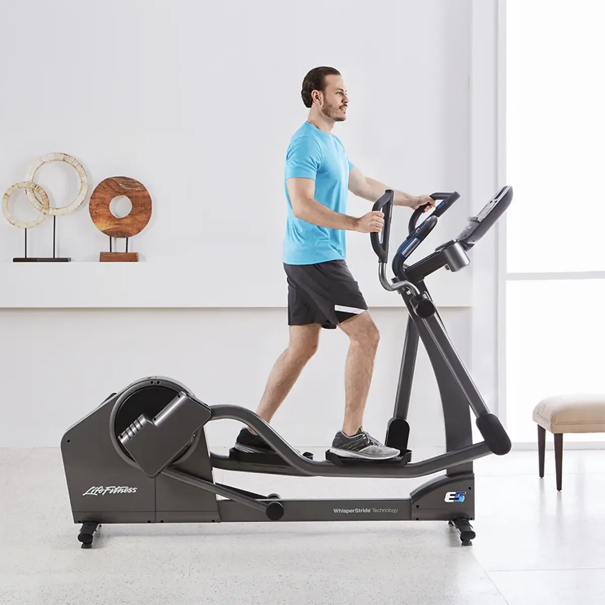 Life Fitness E5 elliptical with multi-grip handles and cushioned pedals