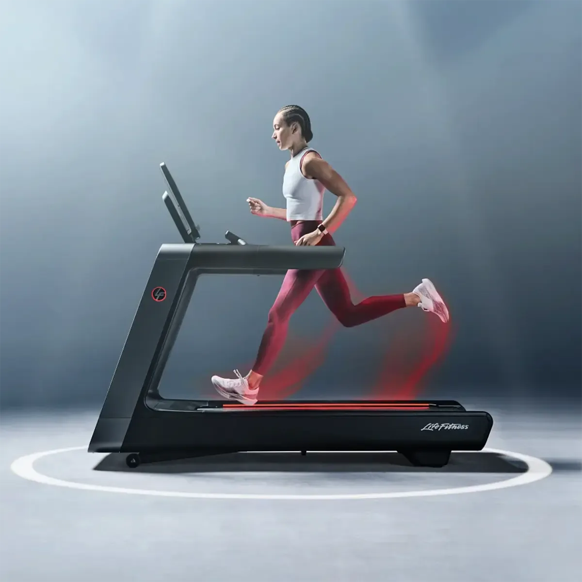 Symbio Runner treadmill with Adaptive Flex Deck and incline controls