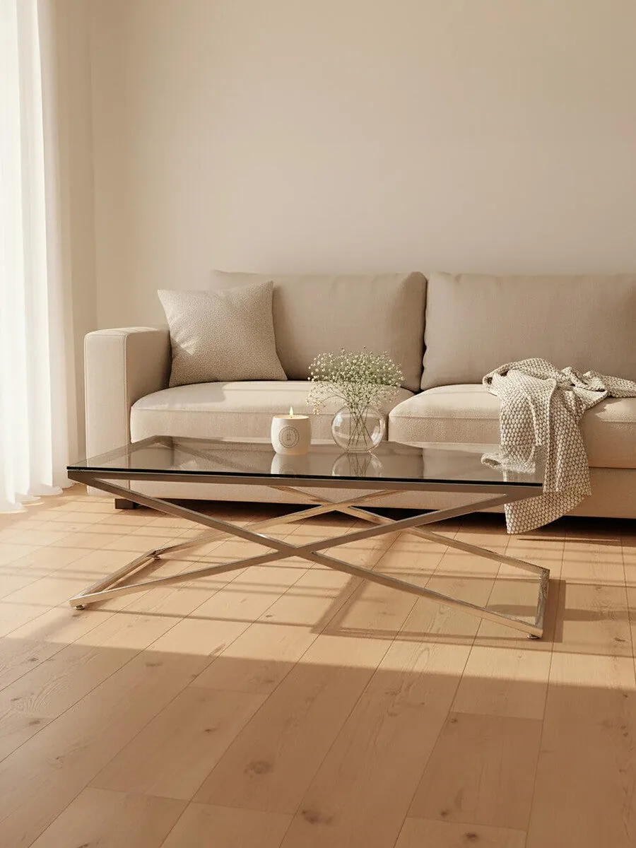Clear Glass Top Coffee Table With Glistening Silver Stainless Steel Cross Base, Montril