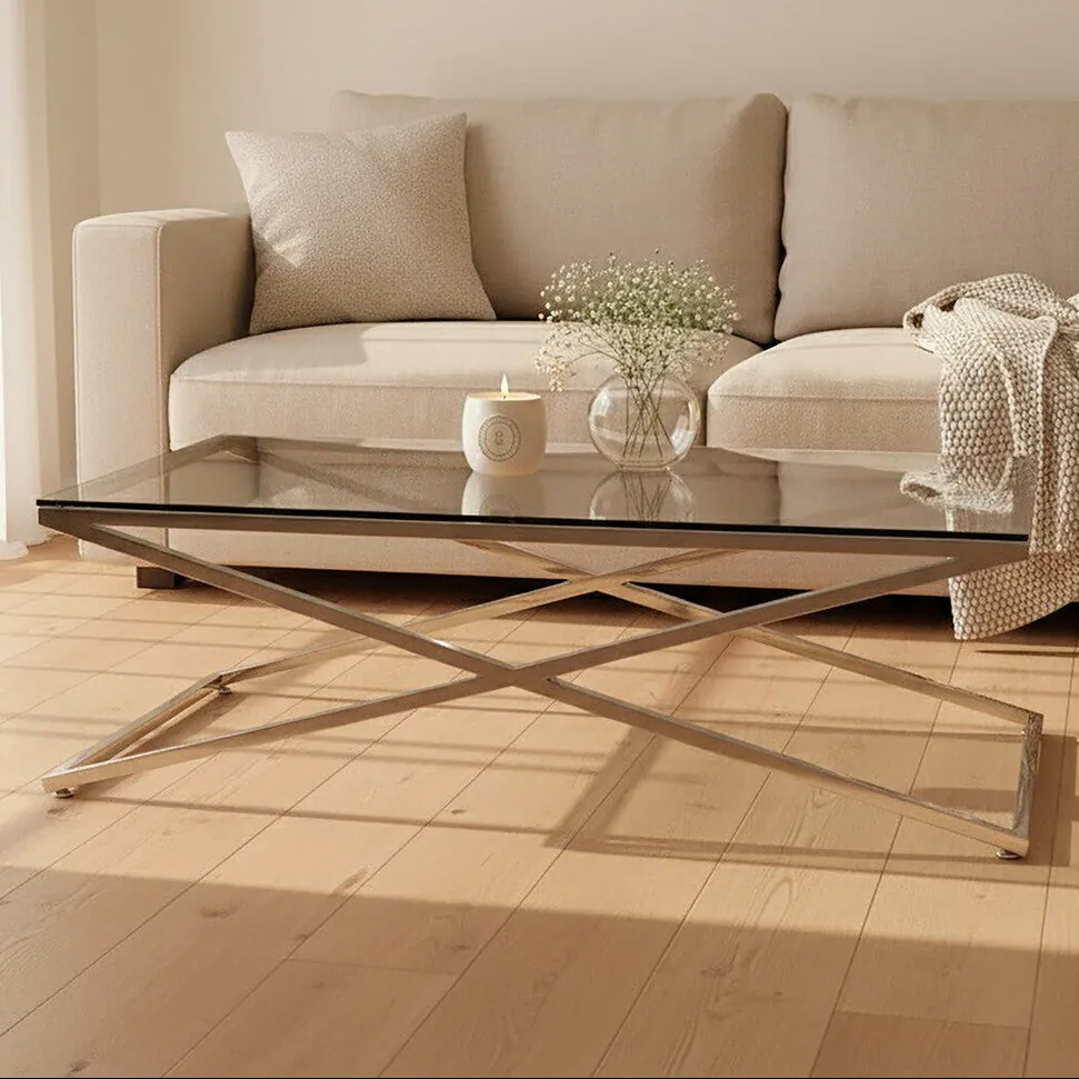 Clear Glass Top Coffee Table With Glistening Silver Stainless Steel Cross Base, Montril